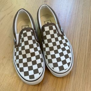 Boys Van’s classic slip-on checkerboard shoe